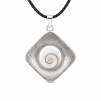 Silver pendant with a white center and black cord on a white background