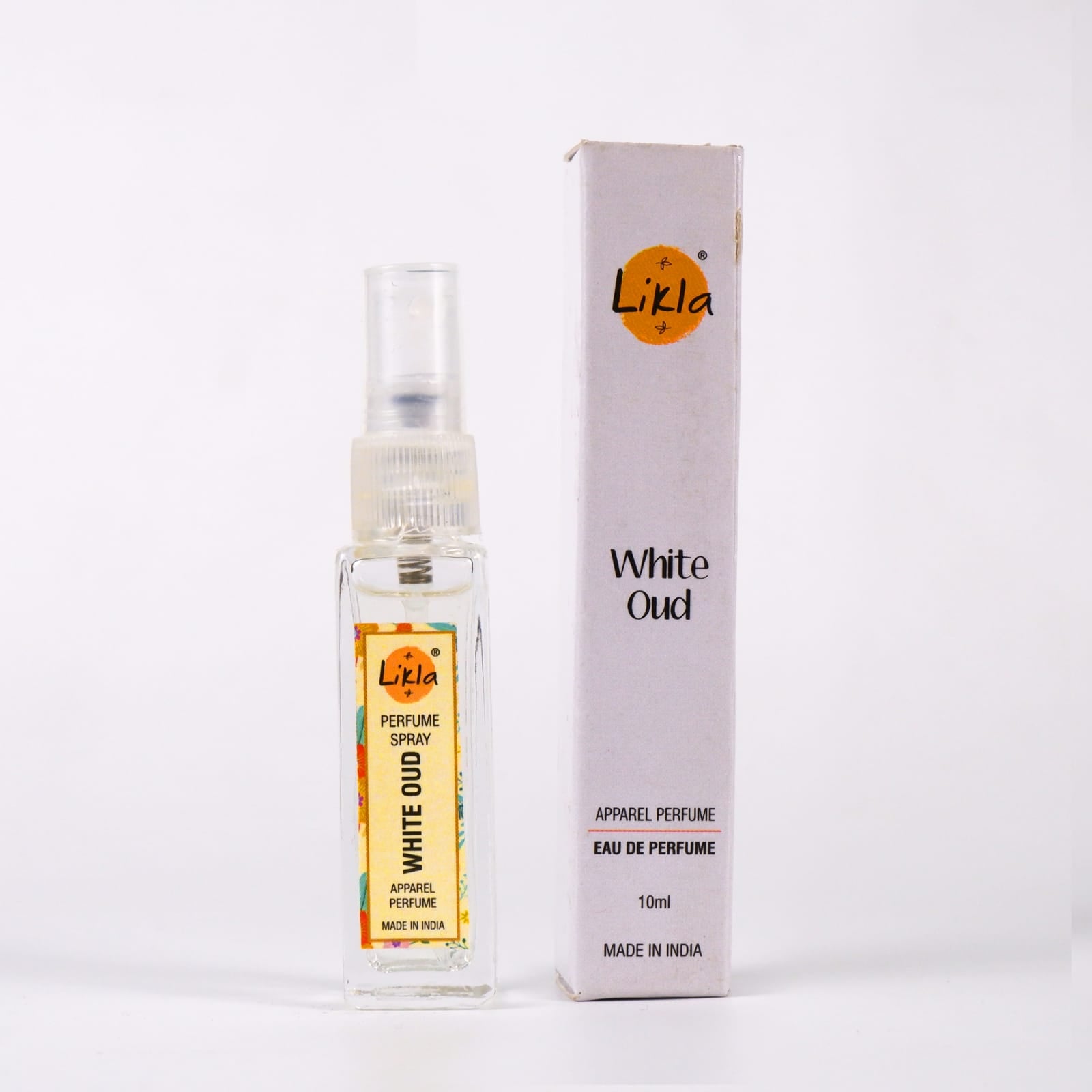 Likla White Oud perfume spray bottle and packaging on a white background