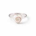 Heart-shaped ring with a spiral design on a white background