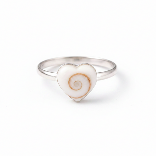 Heart-shaped ring with a spiral design on a white background