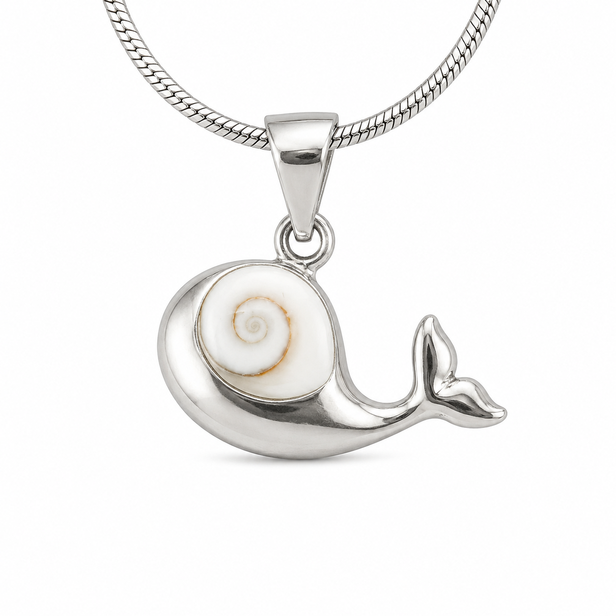 Silver whale pendant with a shell inside on a white background